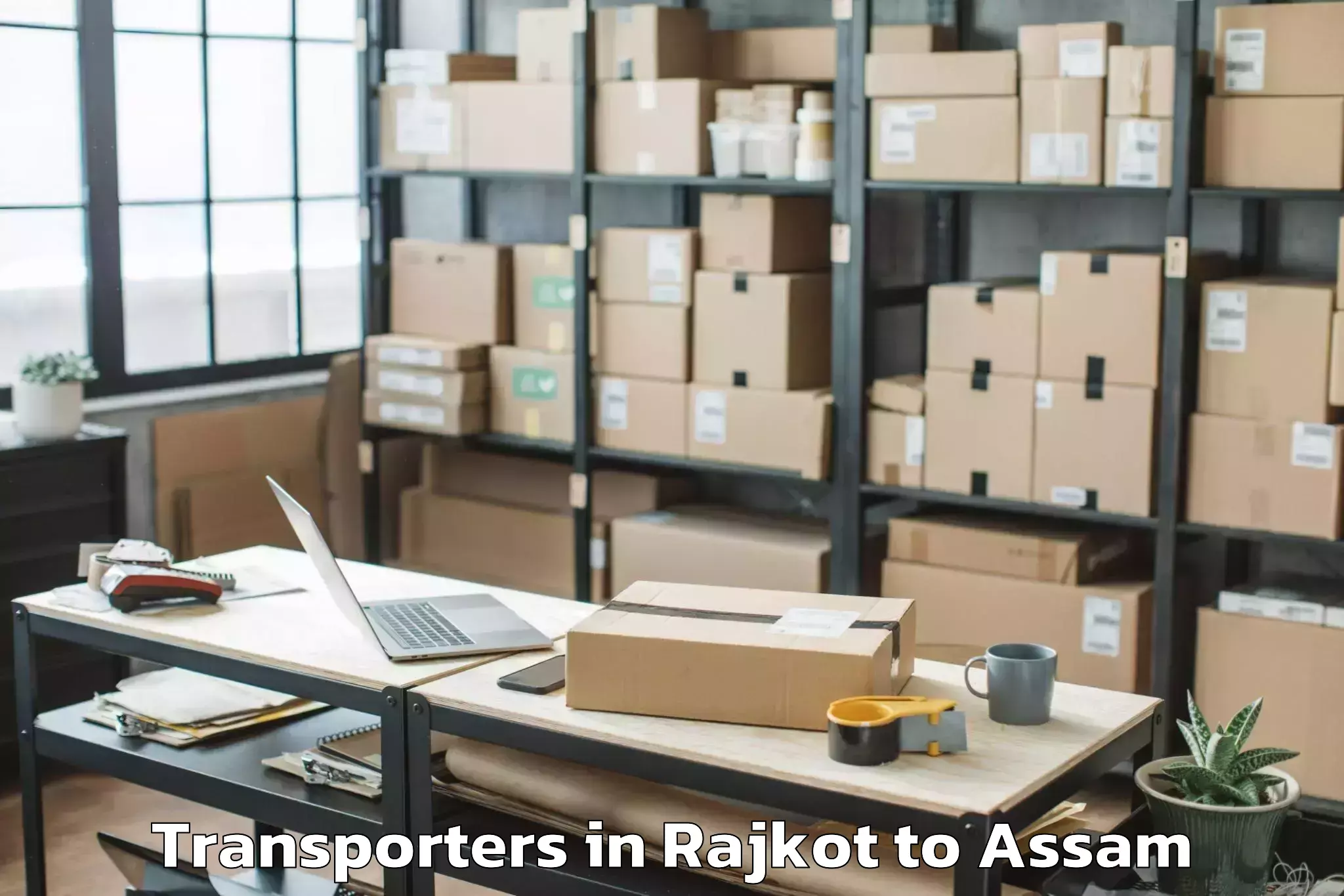 Book Rajkot to Bijni Pt Transporters Online